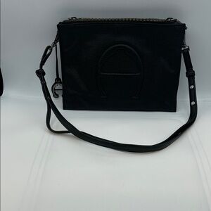 Etienne Aigner black leather Cross body bag. Adeline logo collection.